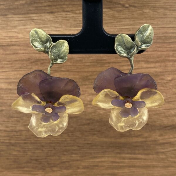 Purple and yellow flower earrings.