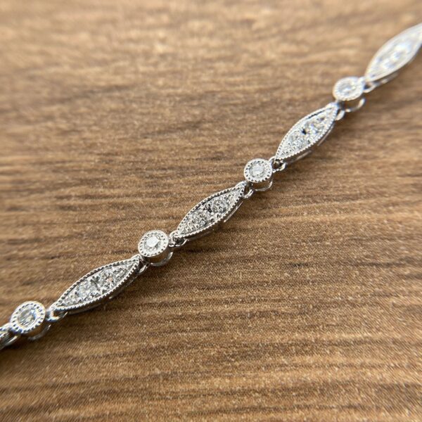 Diamond bracelet with oval-shaped settings.