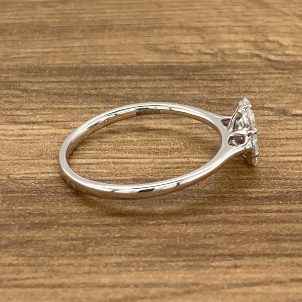 White gold ring with a diamond.