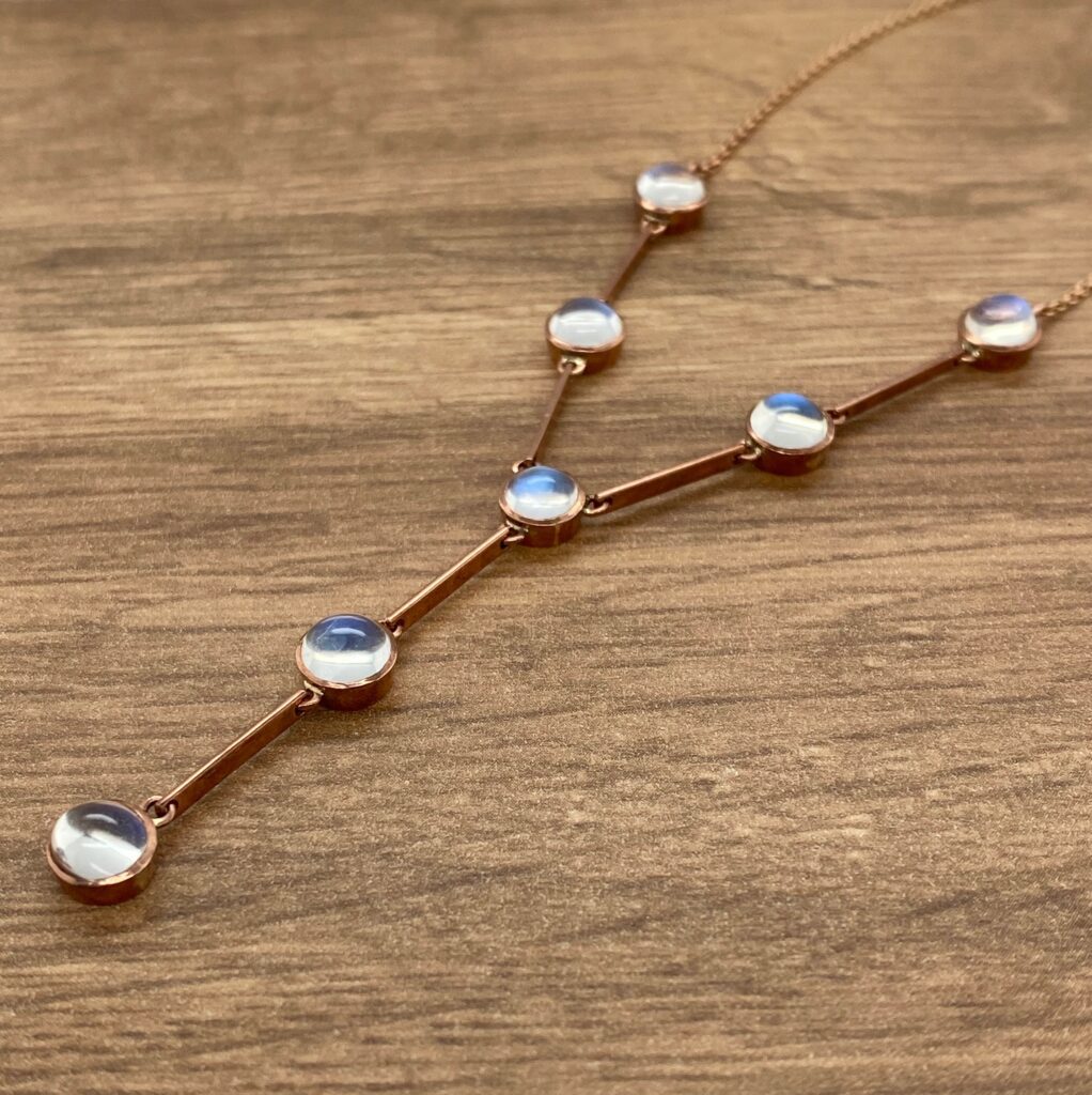 Moonstone lariat necklace in rose gold.