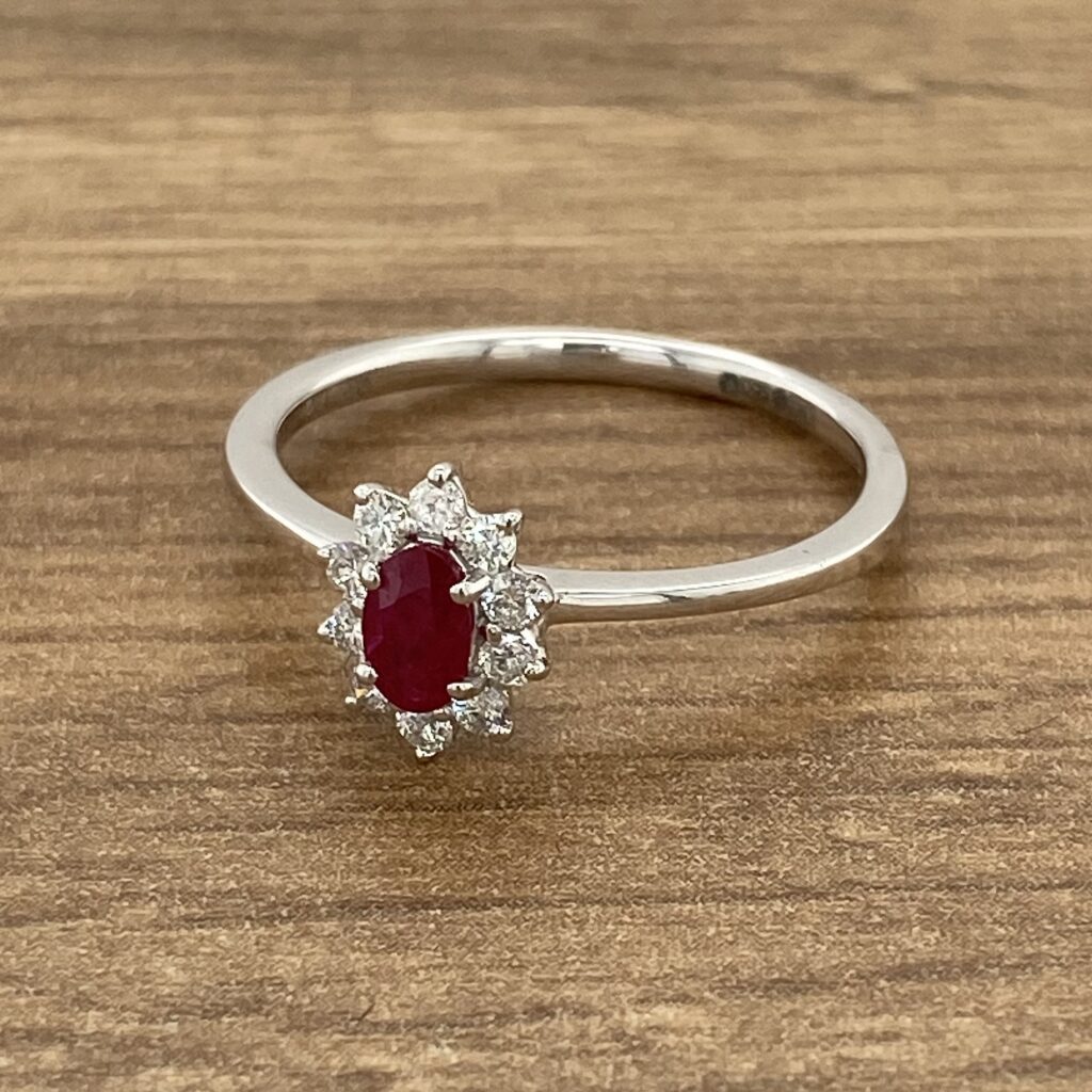 White gold ring with ruby and diamonds.