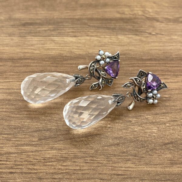 Amethyst and crystal drop earrings.