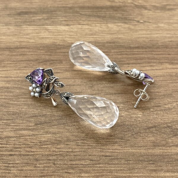 Silver earrings with amethyst and quartz.