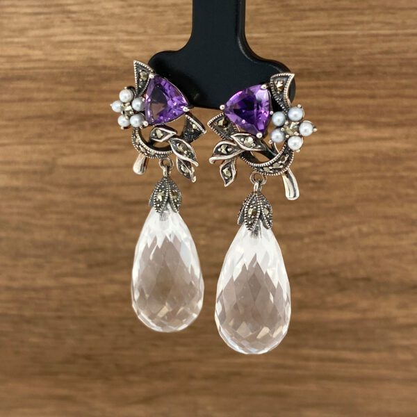 Amethyst and crystal drop earrings.