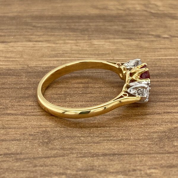 Gold ring with ruby and diamonds.