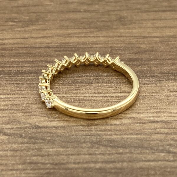 Gold ring with small diamonds.