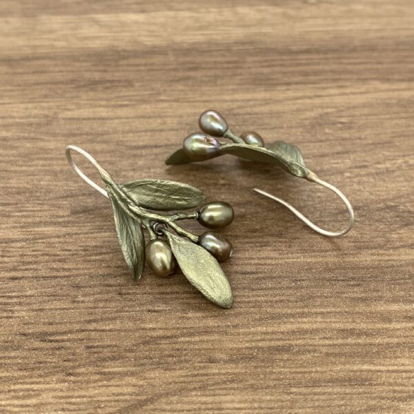 Olive branch earrings with pearls.