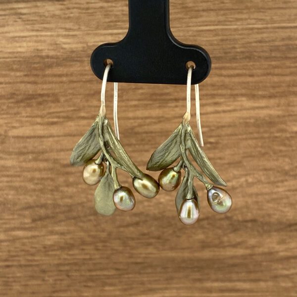 Olive branch earrings with pearl accents.