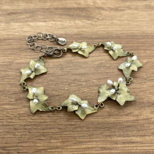 Gold ivy leaf bracelet with pearls.