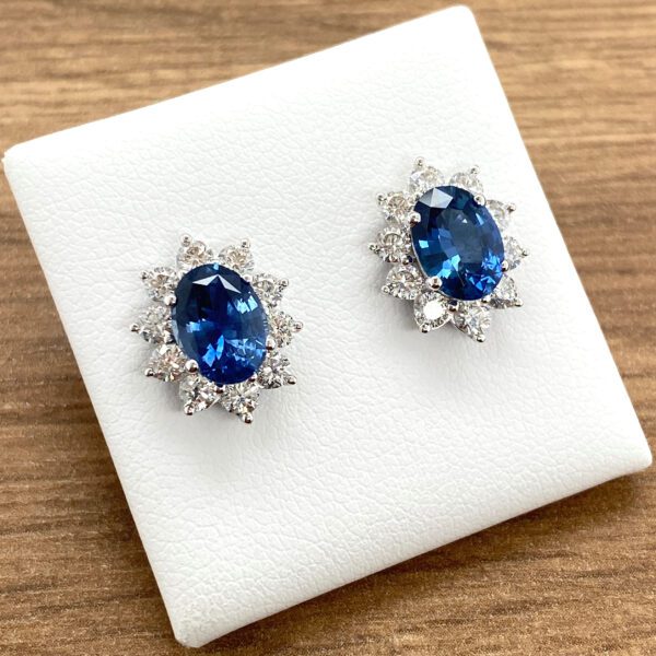 Oval sapphire and diamond earrings.