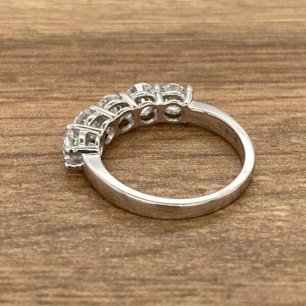 Silver band with diamond ring.