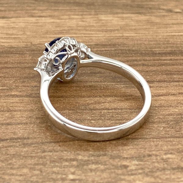 Silver ring with a blue gemstone.