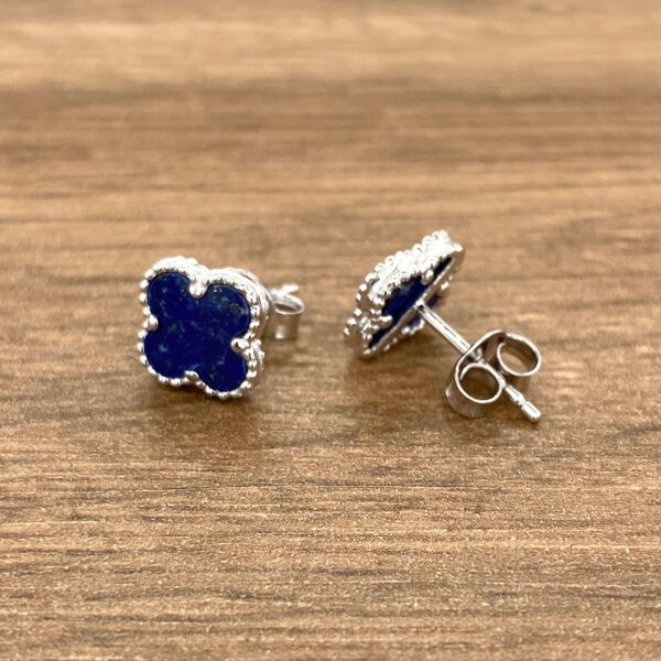 Pair of blue gemstone clover earrings.