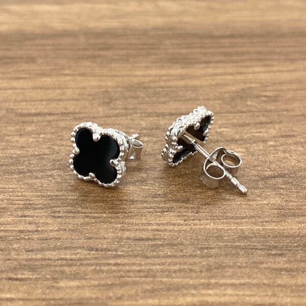 Black onyx four-leaf clover earrings.