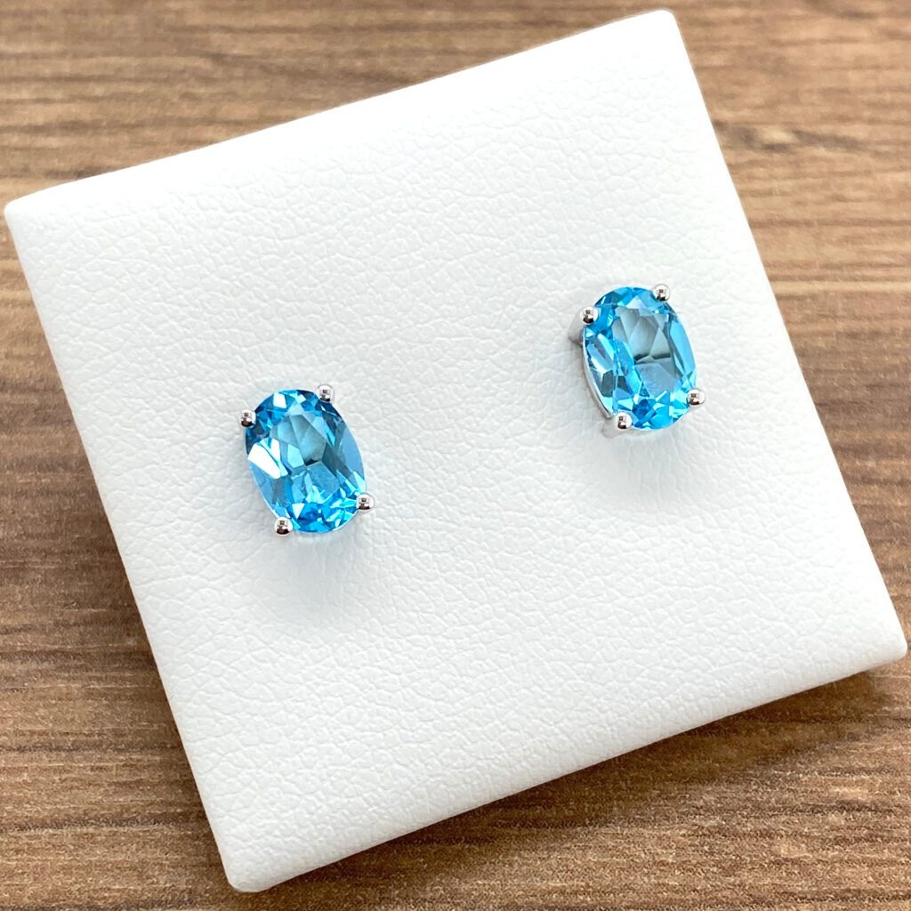 Oval blue topaz stud earrings.