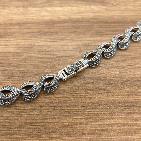 Silver marcasite bracelet clasp detail.