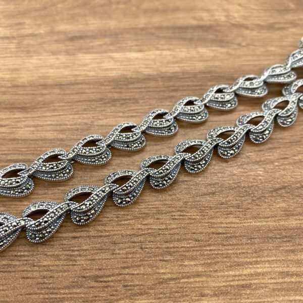 Here's an alt tag for the image: Elegant marcasite silver bracelets.