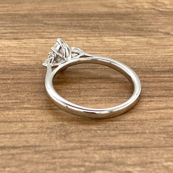 Three-stone diamond engagement ring.