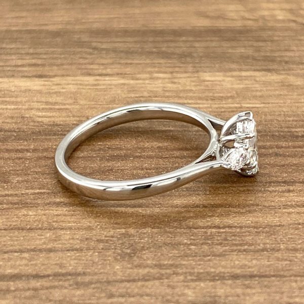Diamond three-stone engagement ring.
