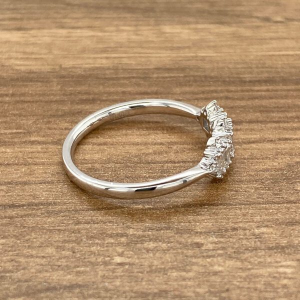 Diamond ring, baguette side stones.