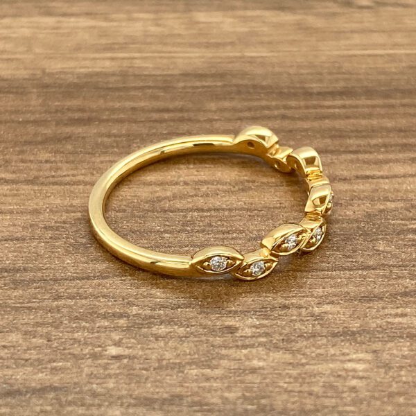 Gold ring with leaf-shaped diamonds.