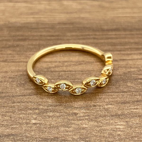 Gold ring with leaf-shaped diamonds.
