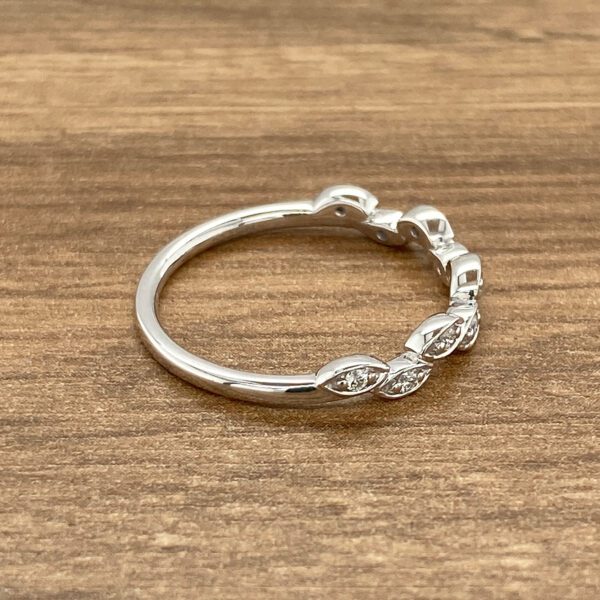 Diamond leaf wedding band ring.