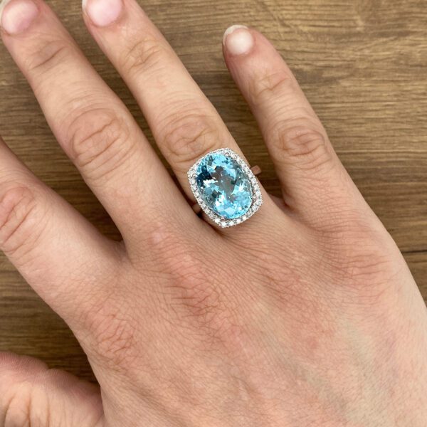 Aquamarine and diamond halo ring.