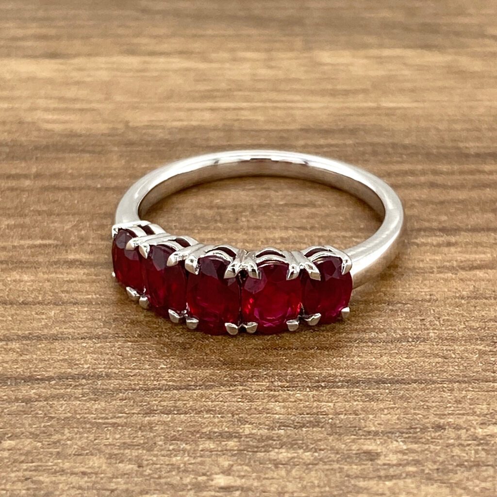 Five-ruby white gold ring.