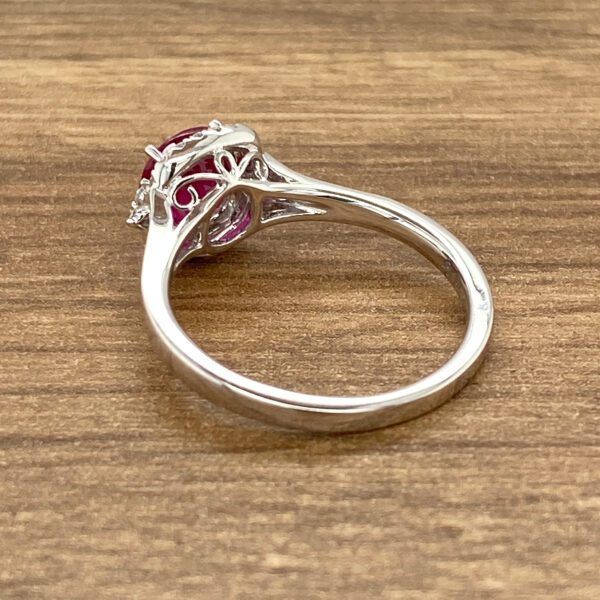 Here's an alt tag for the image: Elegant ruby and diamond ring.