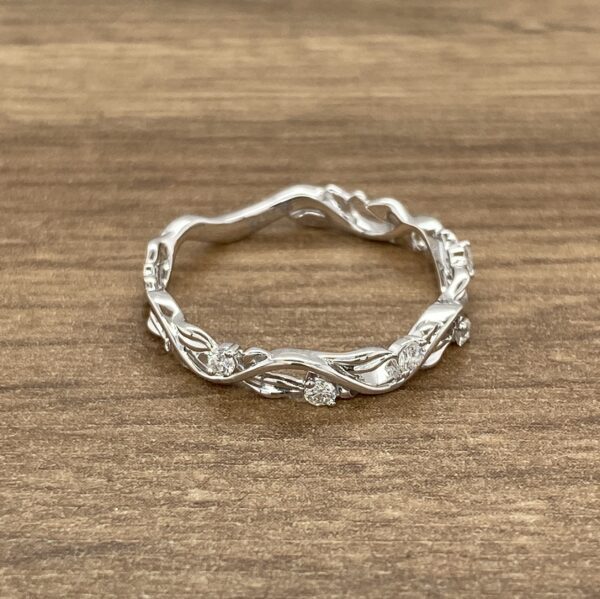 Delicate diamond vine wedding band.