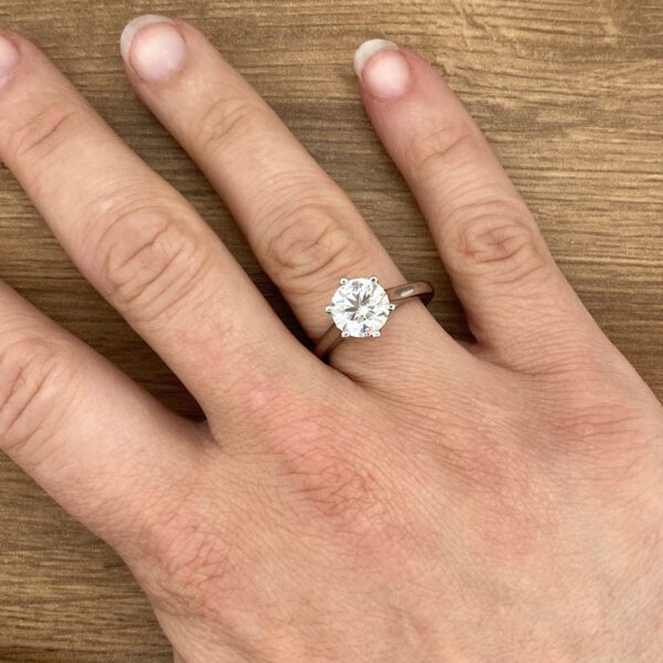 Round diamond solitaire engagement ring.