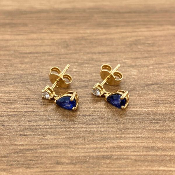 Gold earrings with sapphires and diamonds.