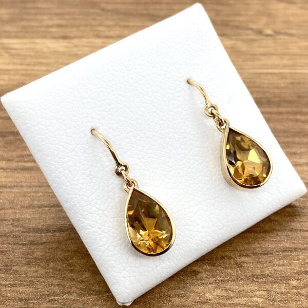 Gold teardrop citrine earrings.