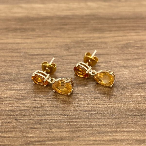Amber gemstone dangling earrings.