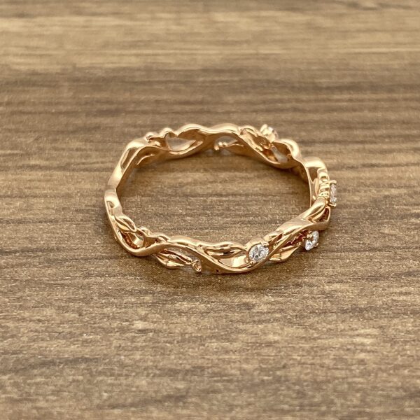 Rose gold vine ring with diamonds.