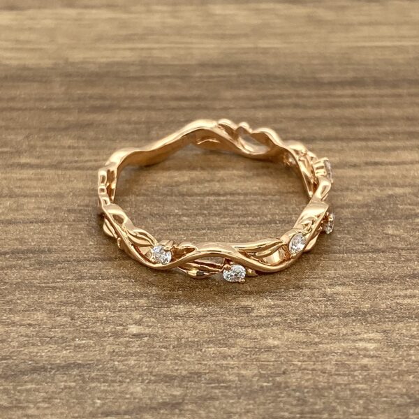 Rose gold vine ring with diamonds.