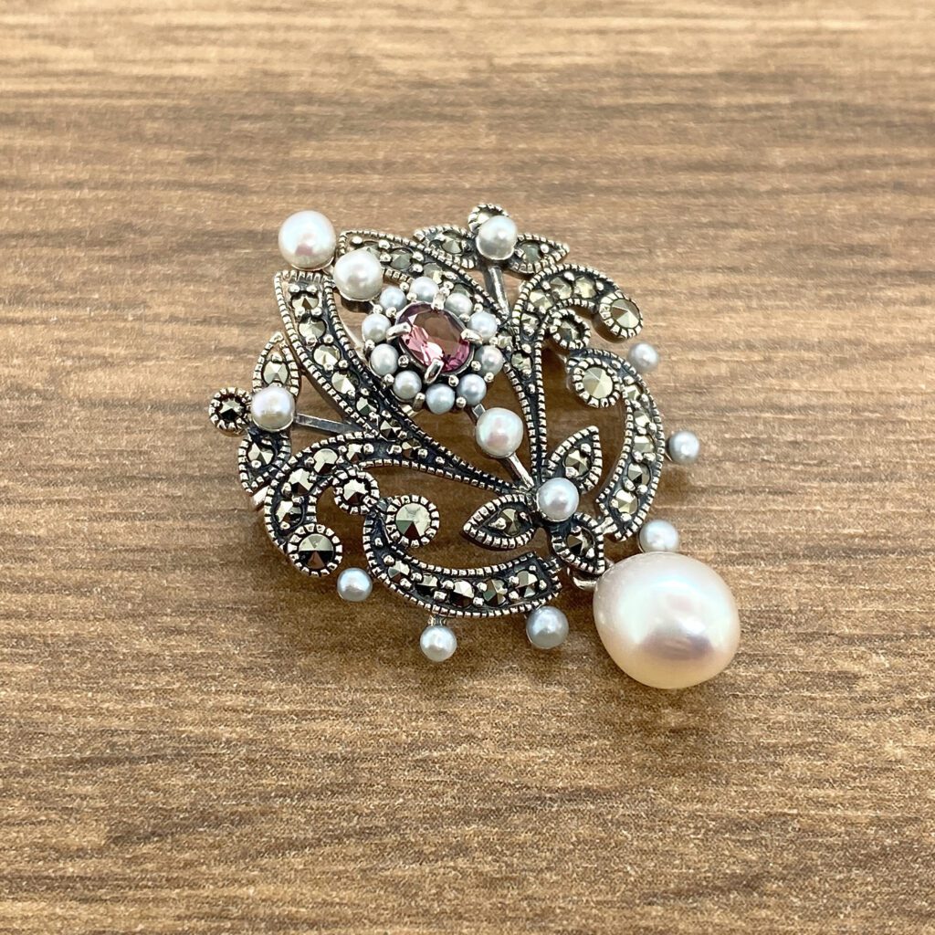 Elegant marcasite pearl brooch pendant.