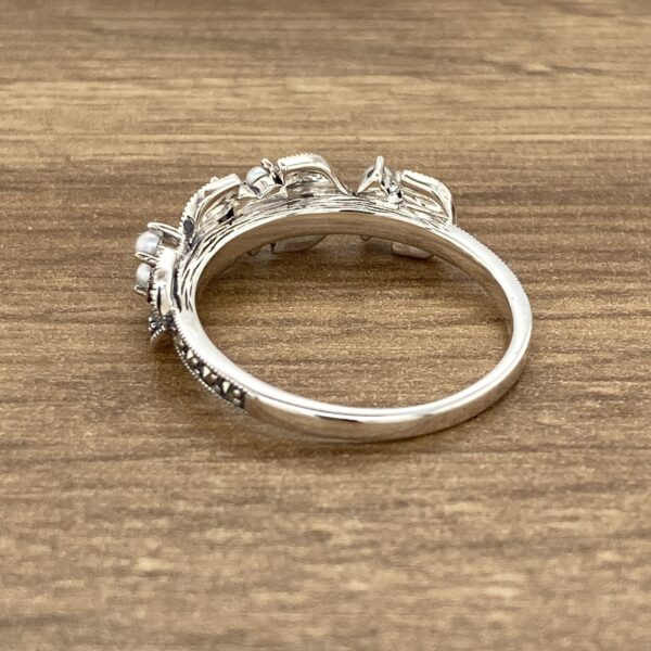 Silver ring with pearls and marcasite.