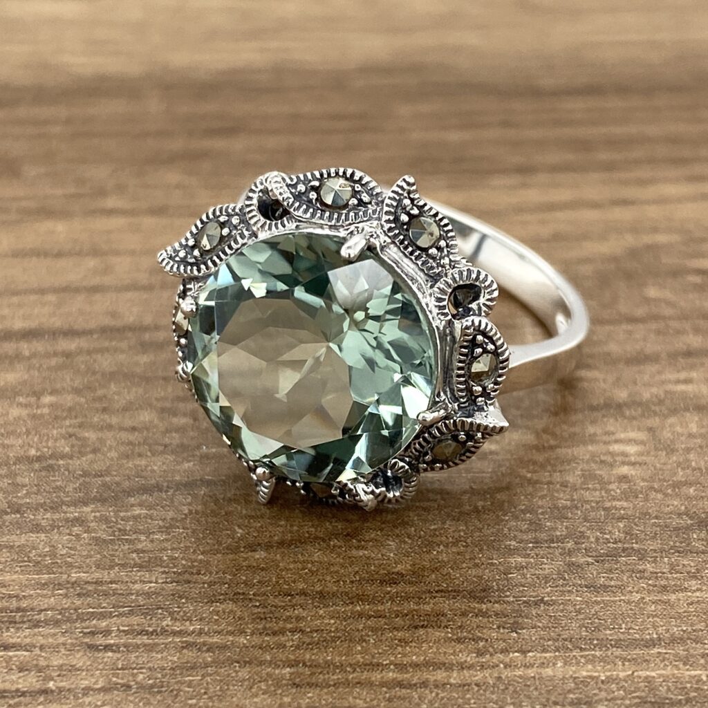 Green gemstone ring with marcasite.