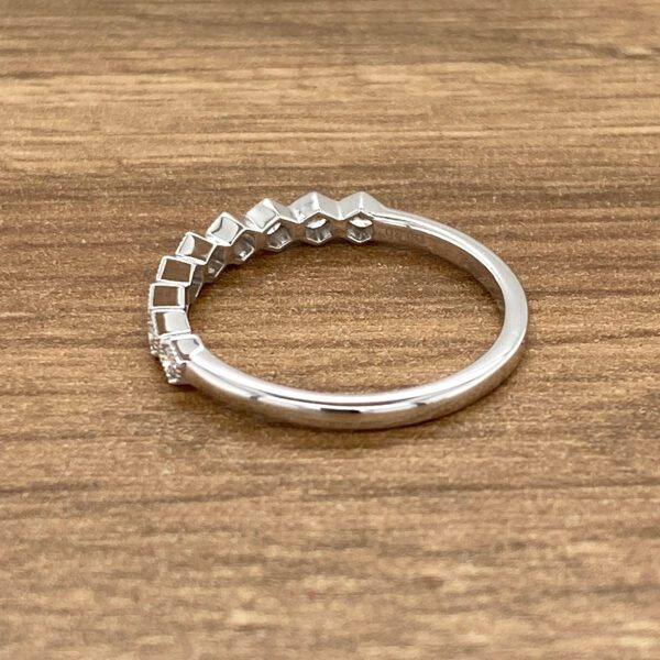 Diamond ring with square-shaped stones.