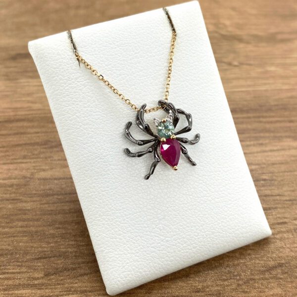 Gemstone spider pendant necklace.