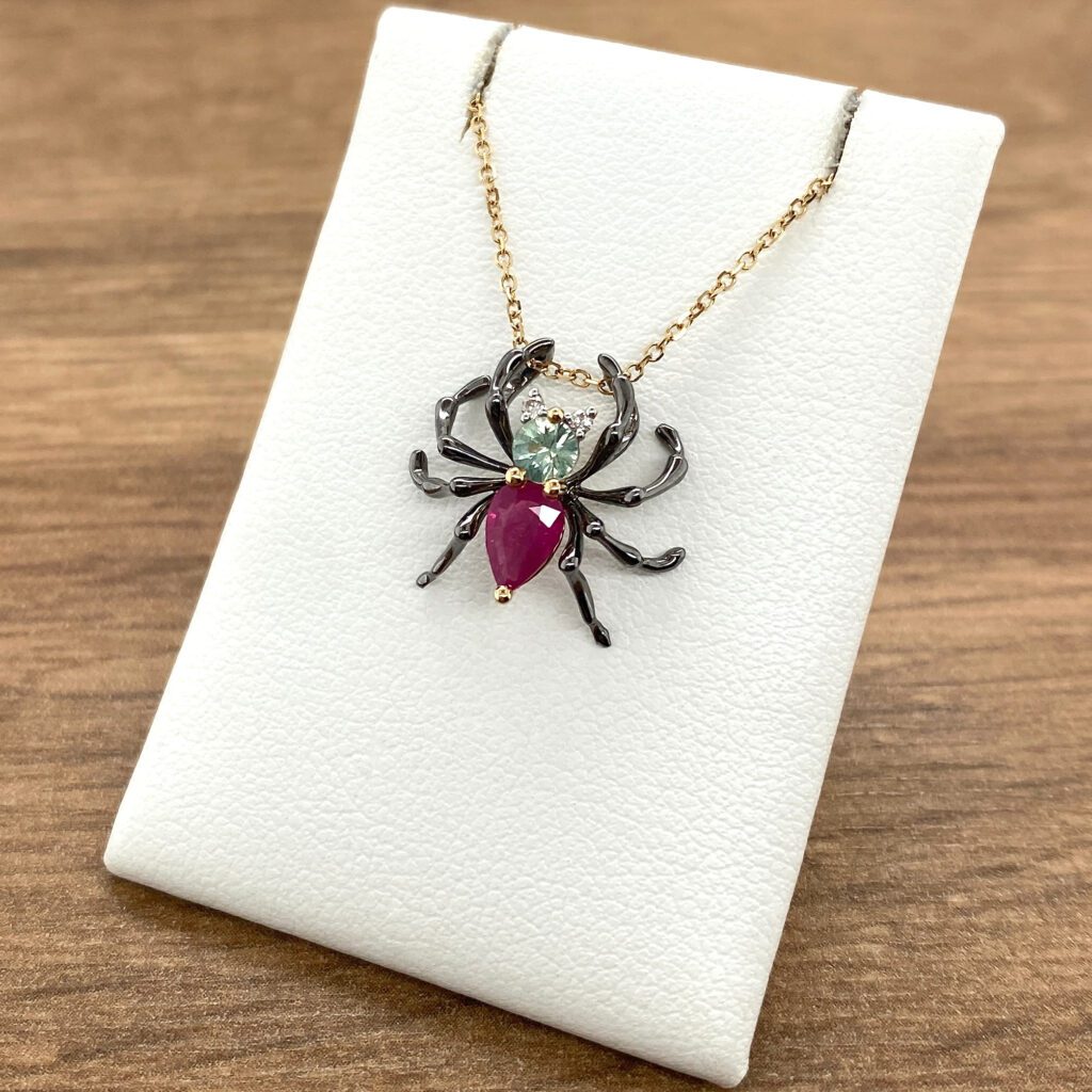 Ruby spider gemstone necklace pendant.
