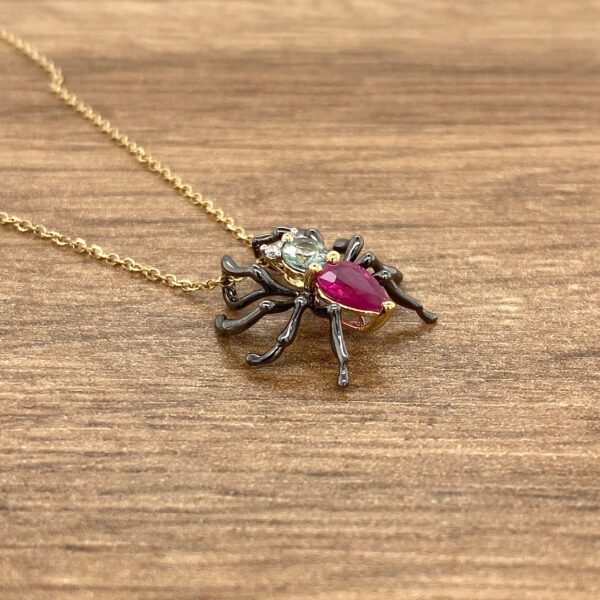 Gemstone spider pendant necklace.