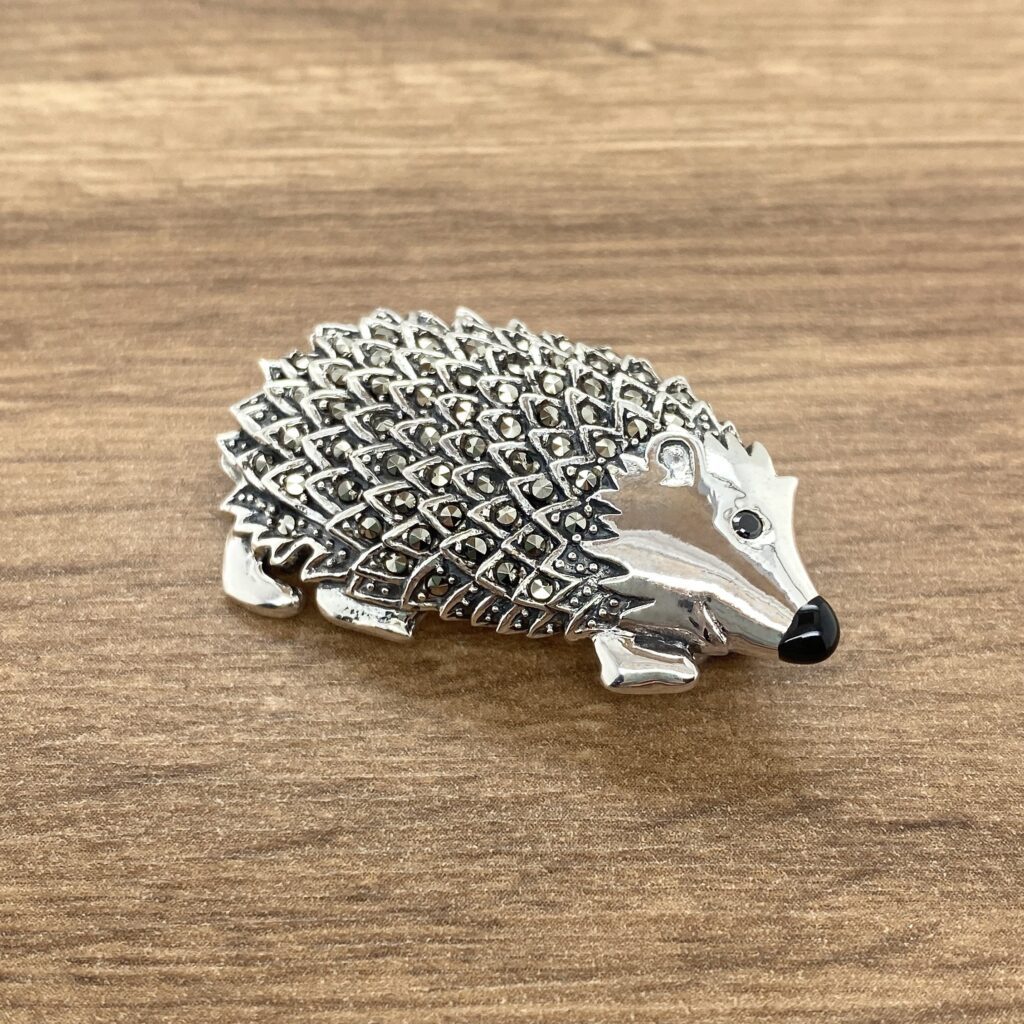 Silver marcasite hedgehog brooch.