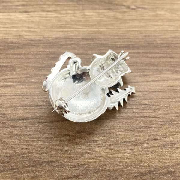 Silver snowman brooch back view.