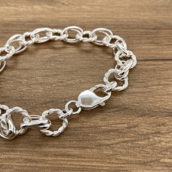 Silver twisted oval link bracelet.