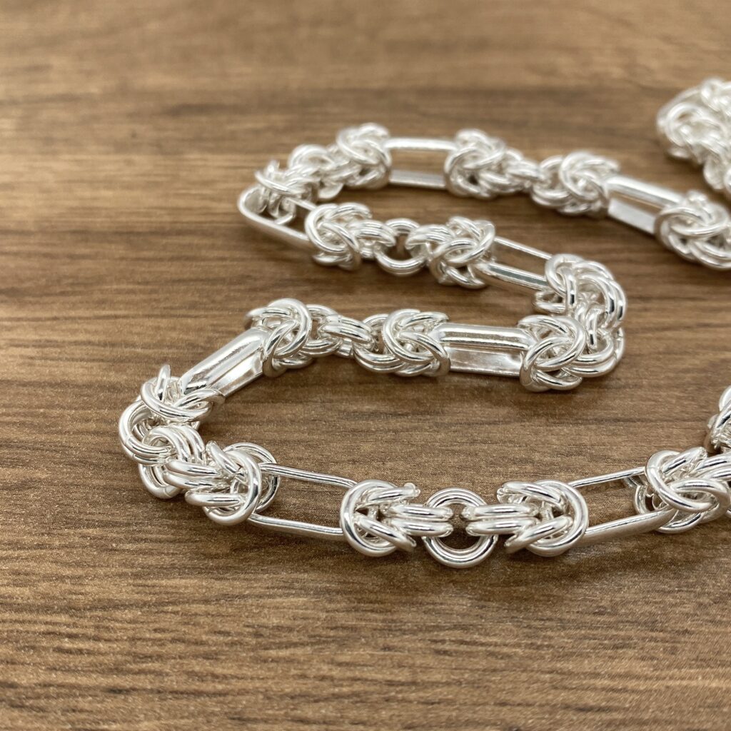 Silver Byzantine chain necklace close-up.