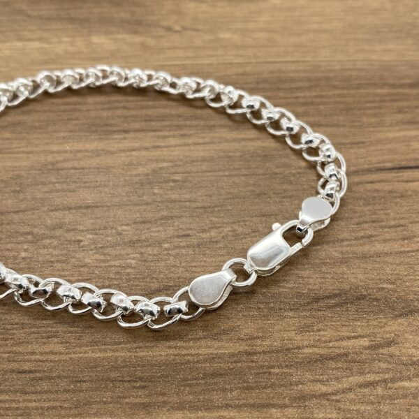 Silver curb chain bracelet jewelry.