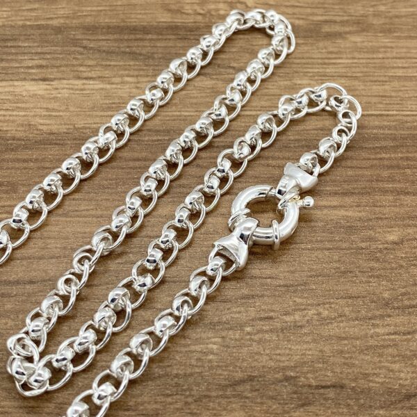 Silver beaded chain necklace clasp.